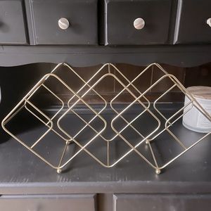 Gold wine rack